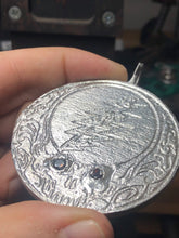 Load image into Gallery viewer, Sterling silver steal your face pendant with cast in place garnet eyes.
